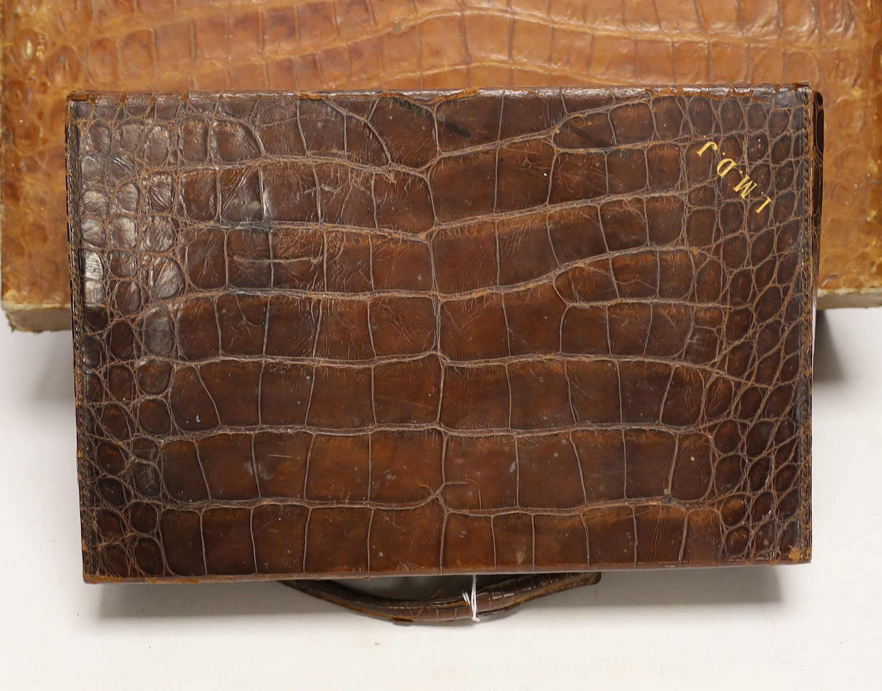 Two crocodile skin cases, 1930s, largest 41cm x 26cm x 15.5cm